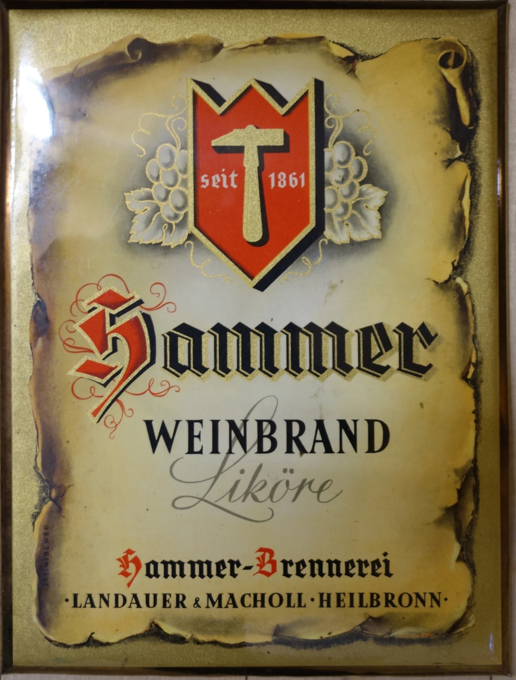 Werbeschild Hammer Weinbrand und Liköre (Schwäbisches Schnapsmuseum Bönnigheim CC BY-NC-SA)