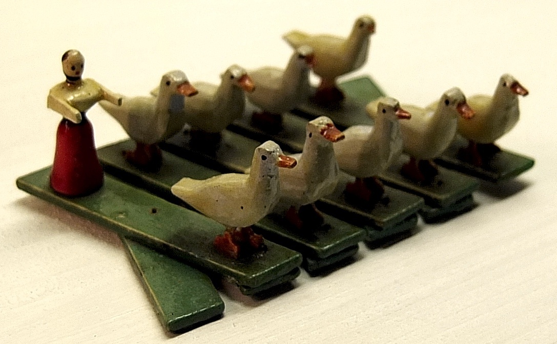 Scherenspiel: Gänsehirtin (Das Kleine Museum - Spielzeug aus zwei Jahrhunderten CC BY)