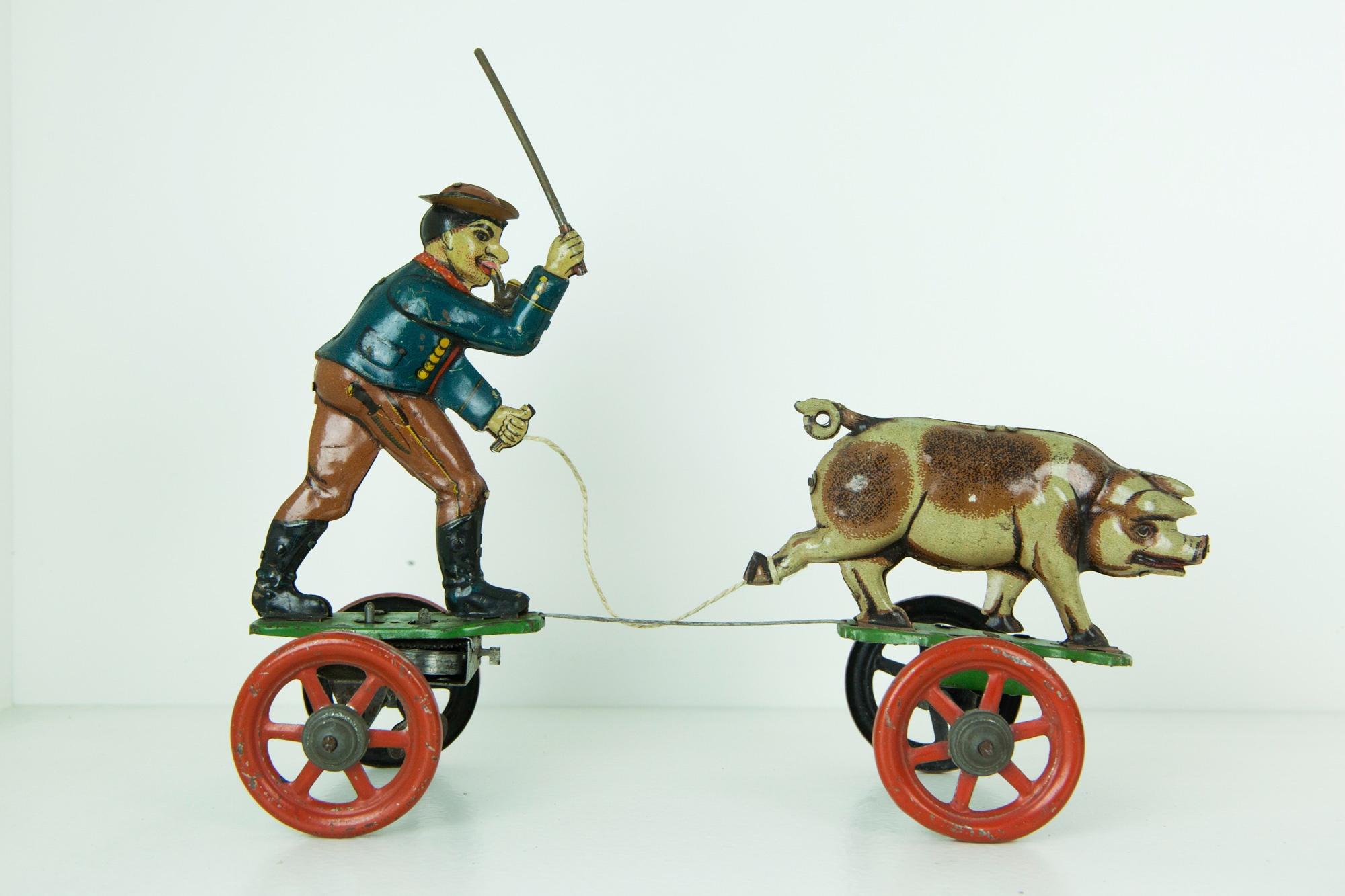 Technofix Bauer und Schwein (Das Kleine Museum - Spielzeug aus zwei Jahrhunderten CC BY)