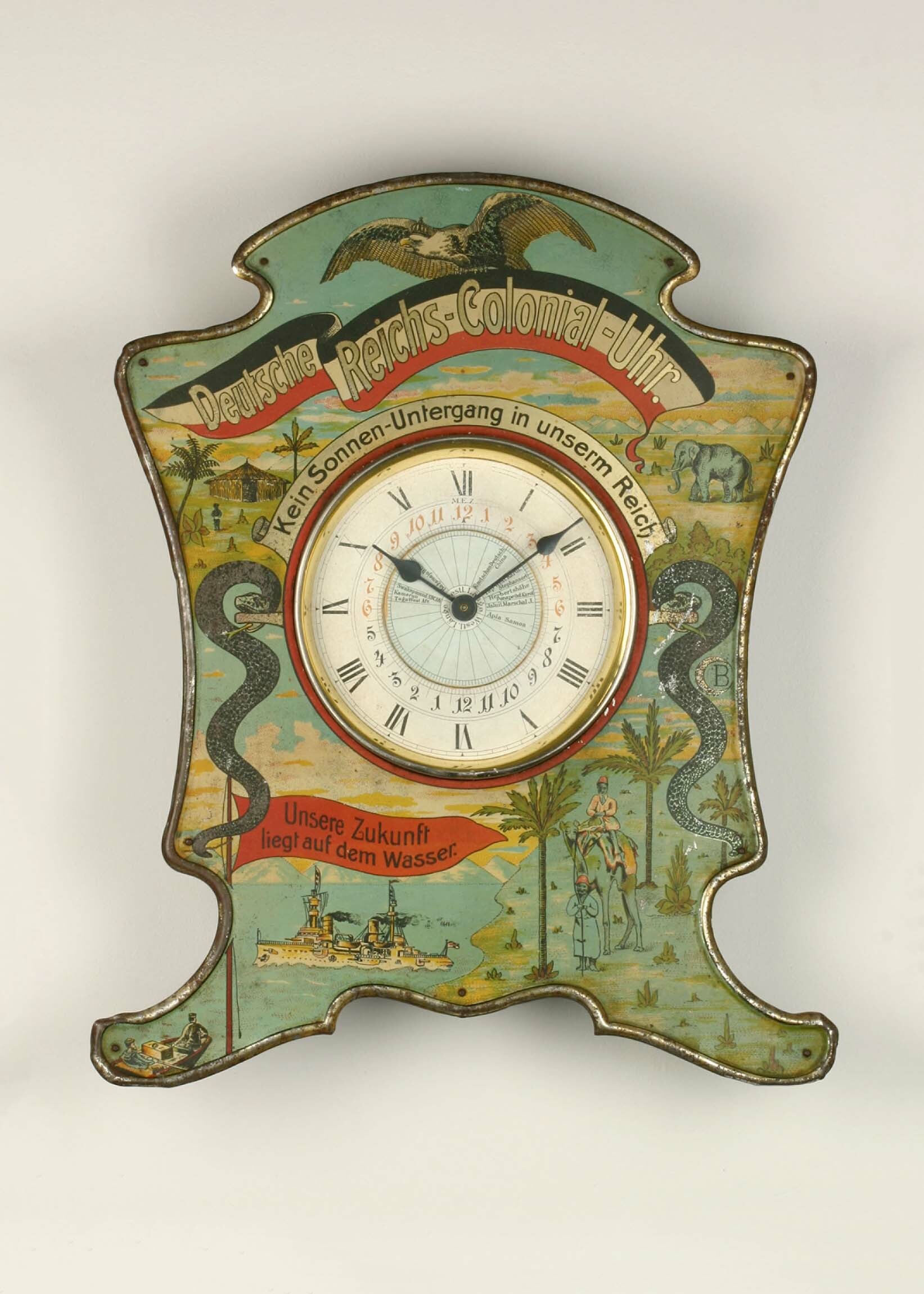 Deutsche Reichs-Colonial-Uhr, Baduf, Furtwangen, um 1904 (Deutsches Uhrenmuseum CC BY-SA)