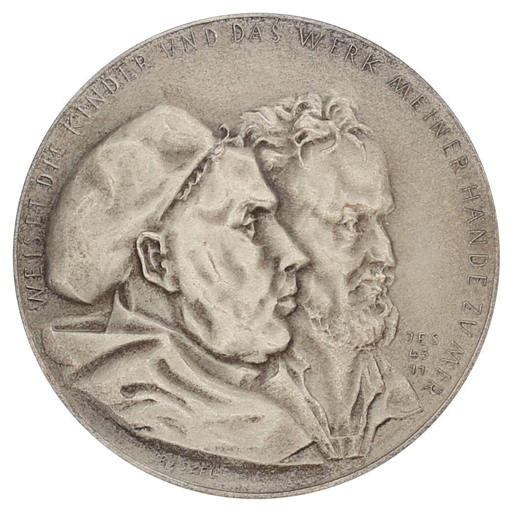 Medaille 1960 auf den Wiederaufbau der evangelischen Schule in Wien (Museum im Melanchthonhaus Bretten CC BY-NC-SA)