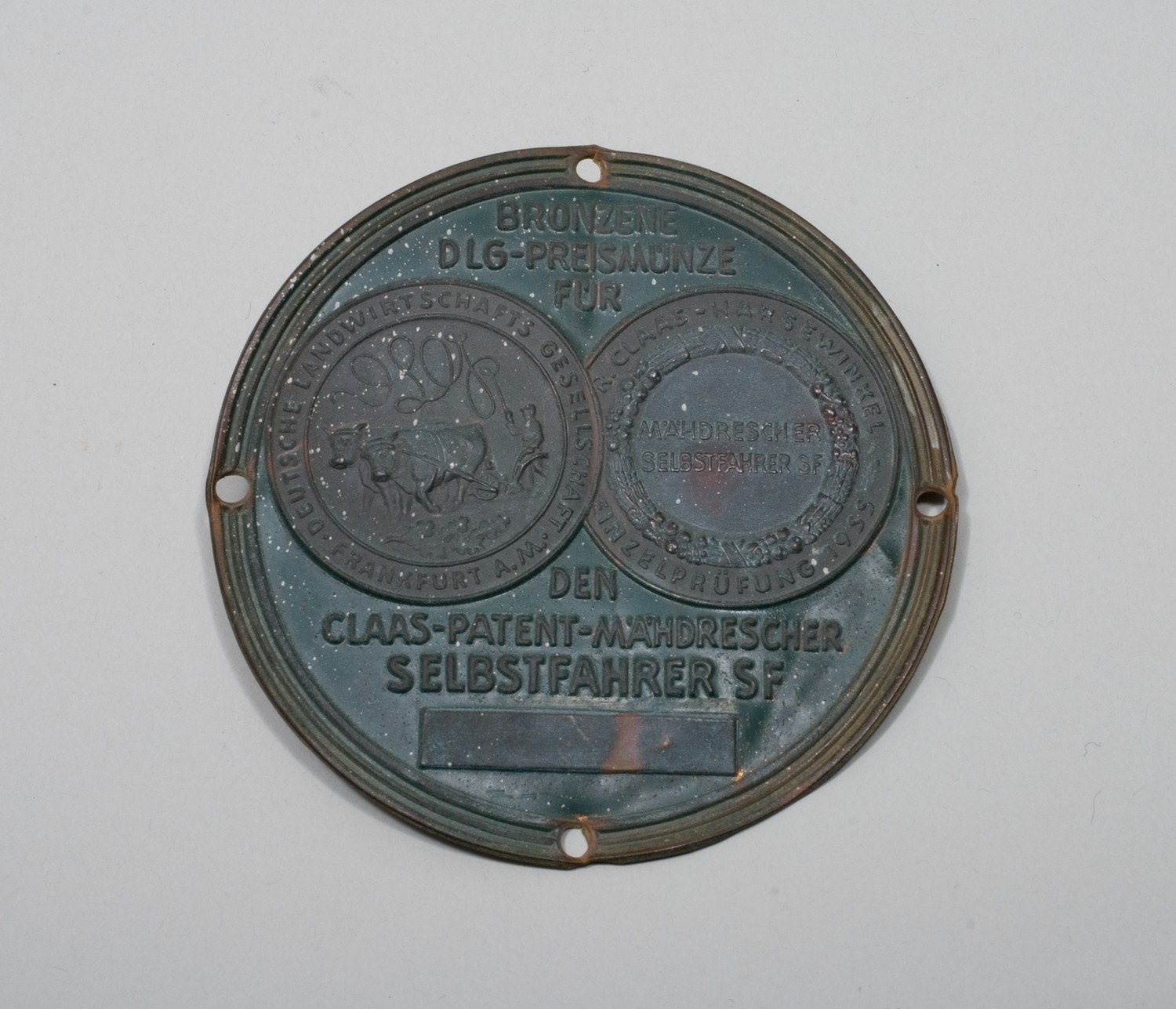 Preismünze der "DLG" für Claas Mähdrescher (Stiftung Domäne Dahlem - Landgut und Museum, Weiternutzung nur mit Genehmigung des Museums CC BY-NC-SA)