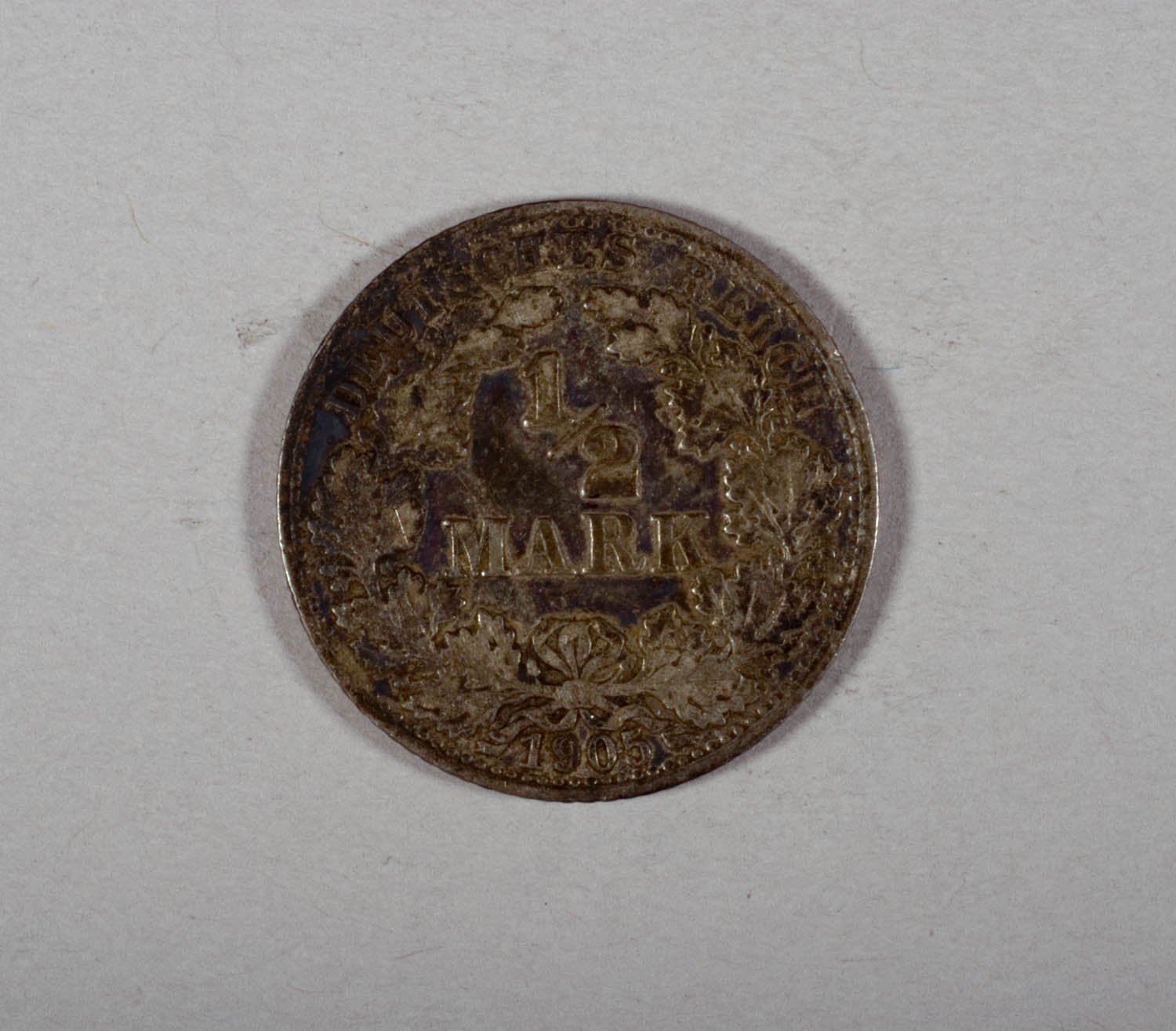 Geldstück: 1/2 Mark (Stiftung Domäne Dahlem - Landgut und Museum, Weiternutzung nur mit Genehmigung des Museums CC BY-NC-SA)