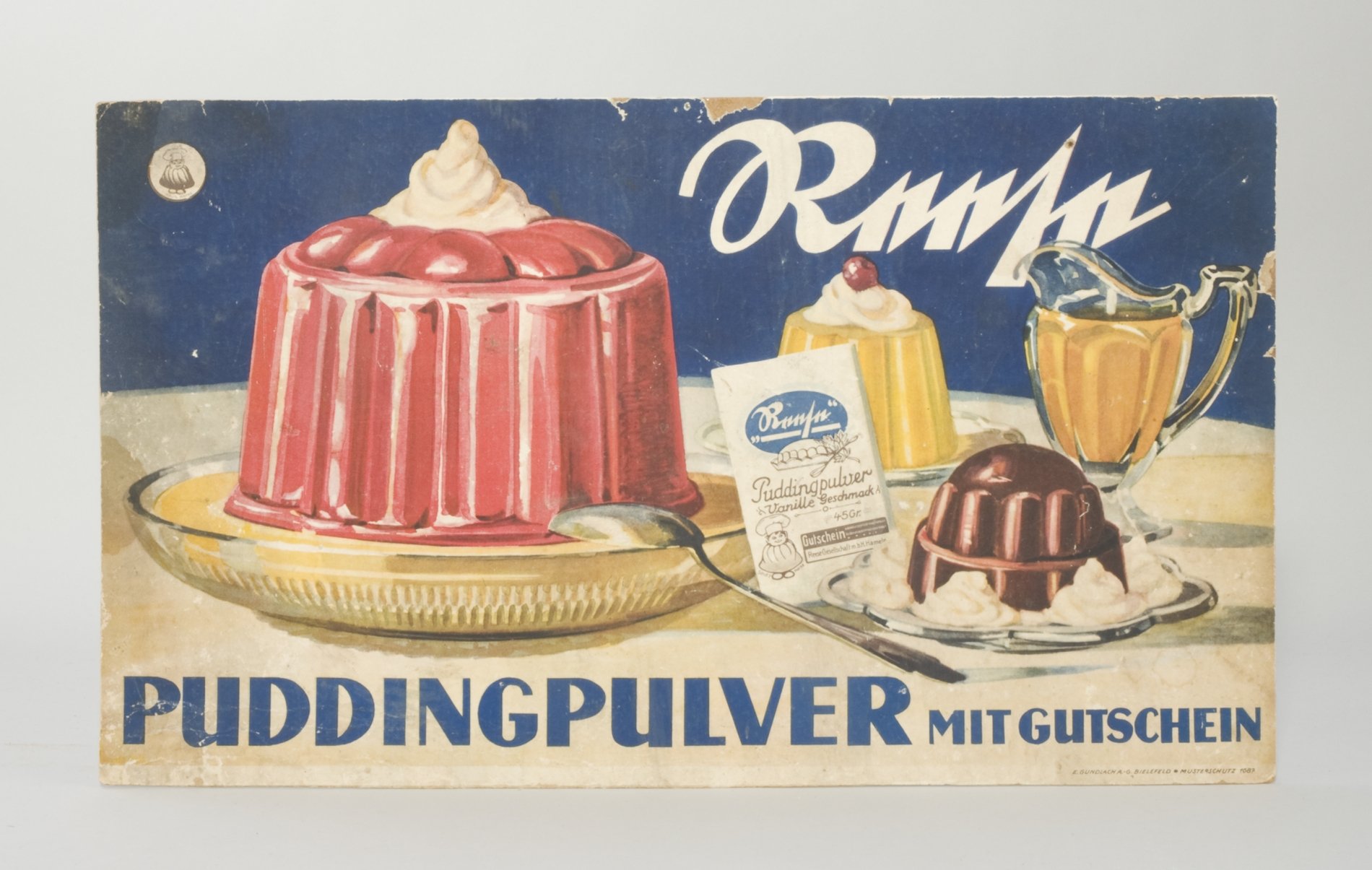 Reklameschild "Reese Puddingpulver" (Stiftung Domäne Dahlem - Landgut und Museum, Weiternutzung nur mit Genehmigung des Museums CC BY-NC-SA)