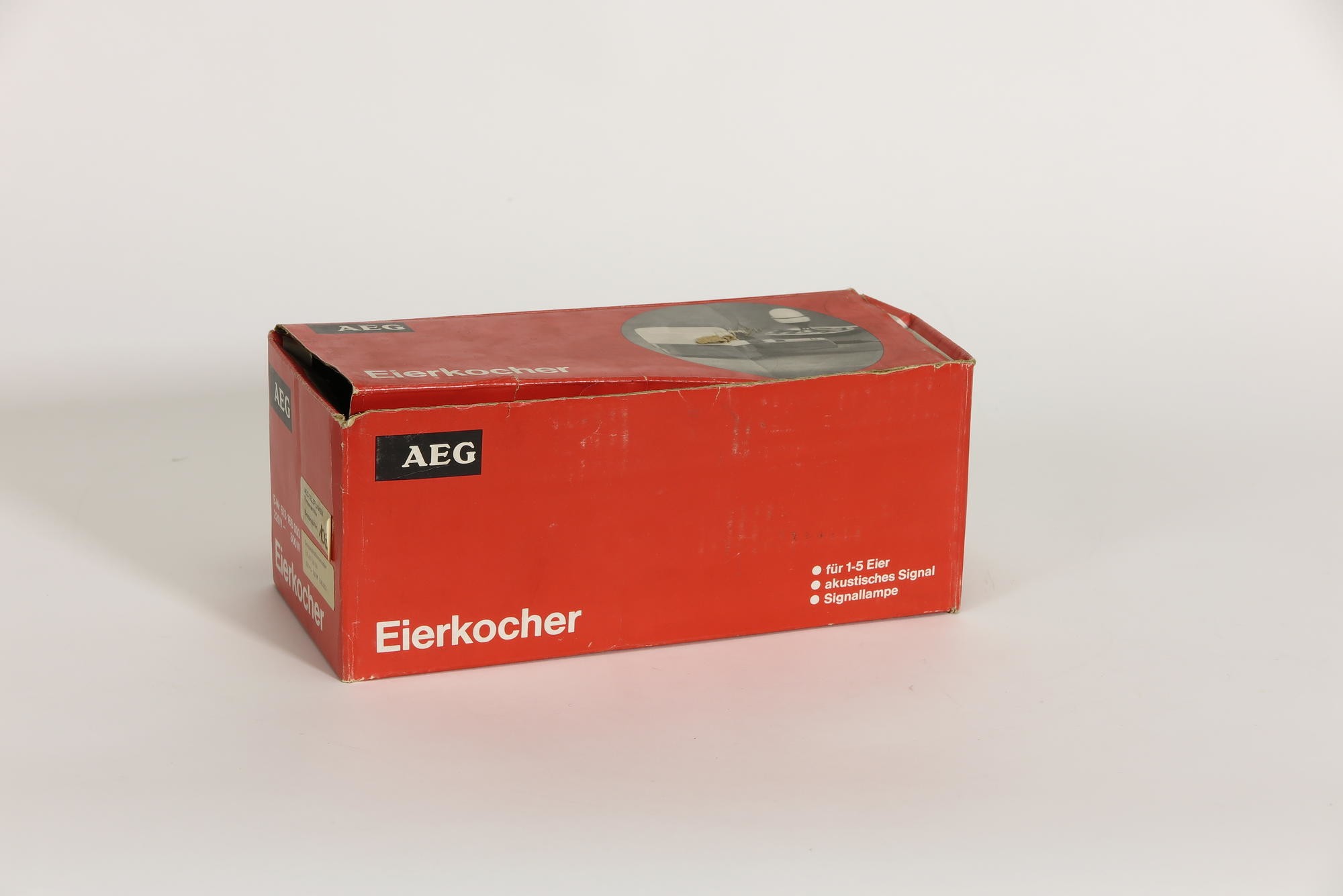 Verpackungskarton, Zubehör zu Elektrischer Eierkocher AEG Typ EKS (Stiftung Deutsches Technikmuseum Berlin CC0)