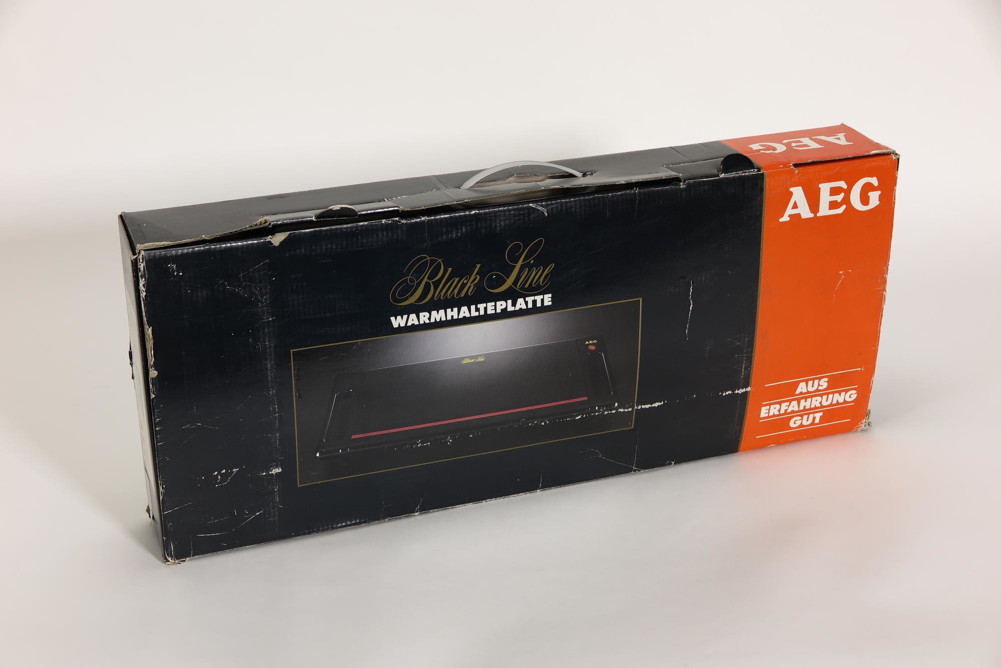 Verpackungskarton, Zubehör zu Warmhalteplatte AEG Typ EWK 0046 Modell WHP BL `Black Line Wärmehalteplatte` (Stiftung Deutsches Technikmuseum Berlin CC0)