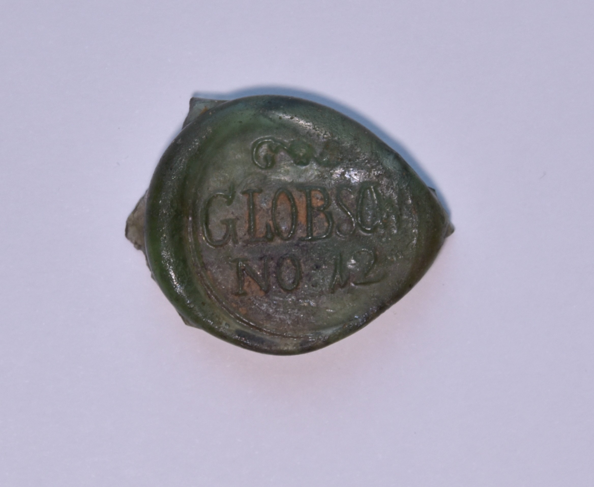 Glasmarke aus Globsow (Museum für Stadtgeschichte Templin CC BY-NC-SA)