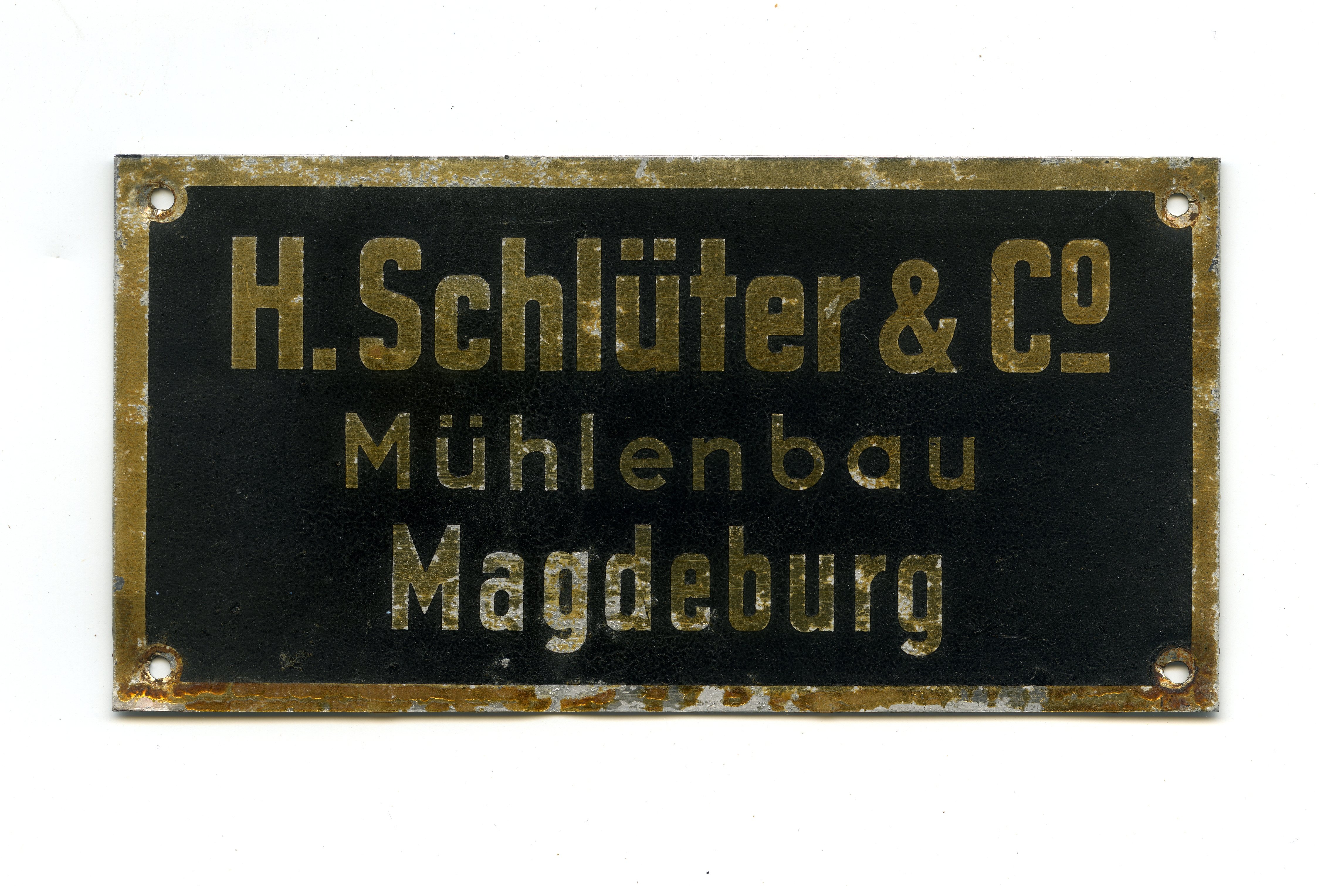 Firmenschild Mühlenbau-Anstalt H. Schlüter & Co. (Historische Mühle von Sanssouci CC BY-NC-SA)