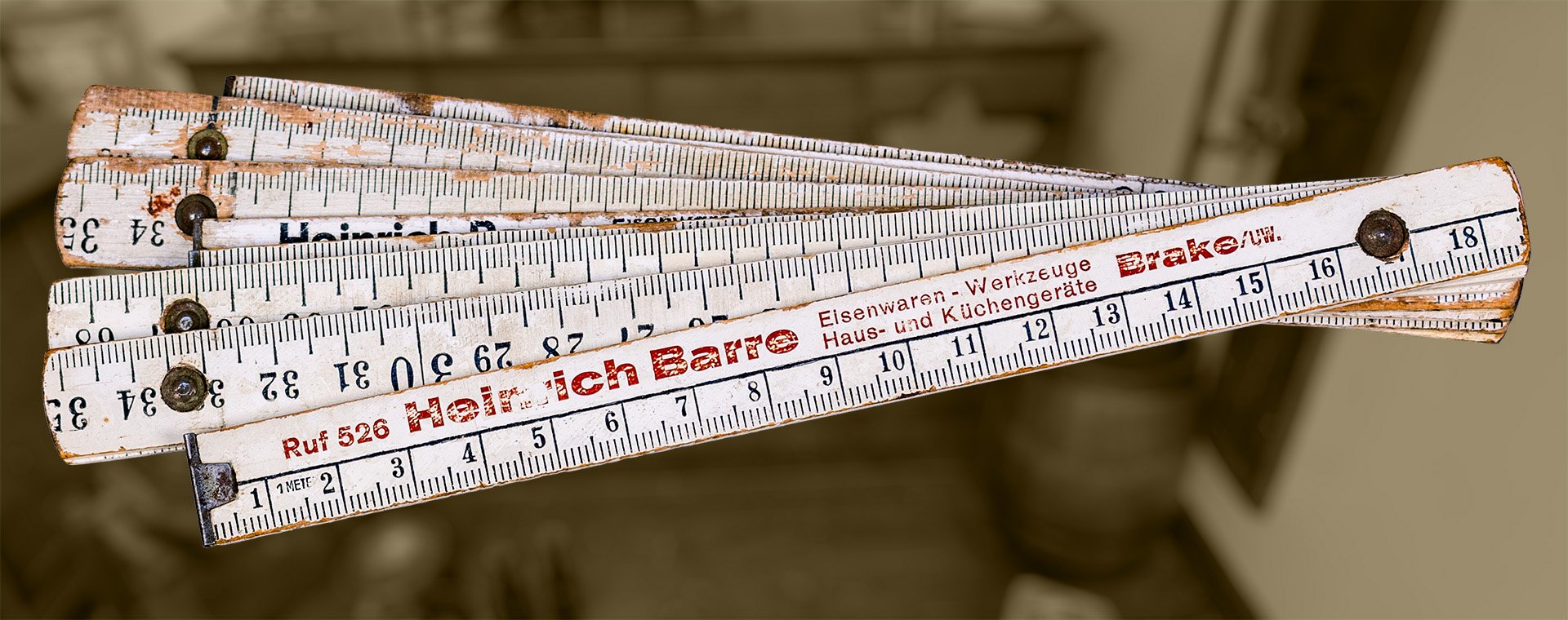 Gliedermaßstab (Zollstock) „Heinrich Barre, Eisen- und Haushaltswaren, Brake“ (Schiffahrtsmuseum Unterweser CC BY-NC-SA)