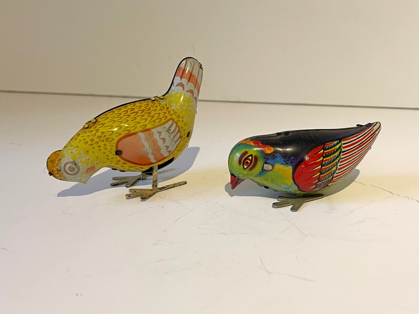 Konvolut Spielzeug Blechhuhn und Blechvögelchen mit Aufziehmotor (Museum Guntersblum CC BY-NC-SA)