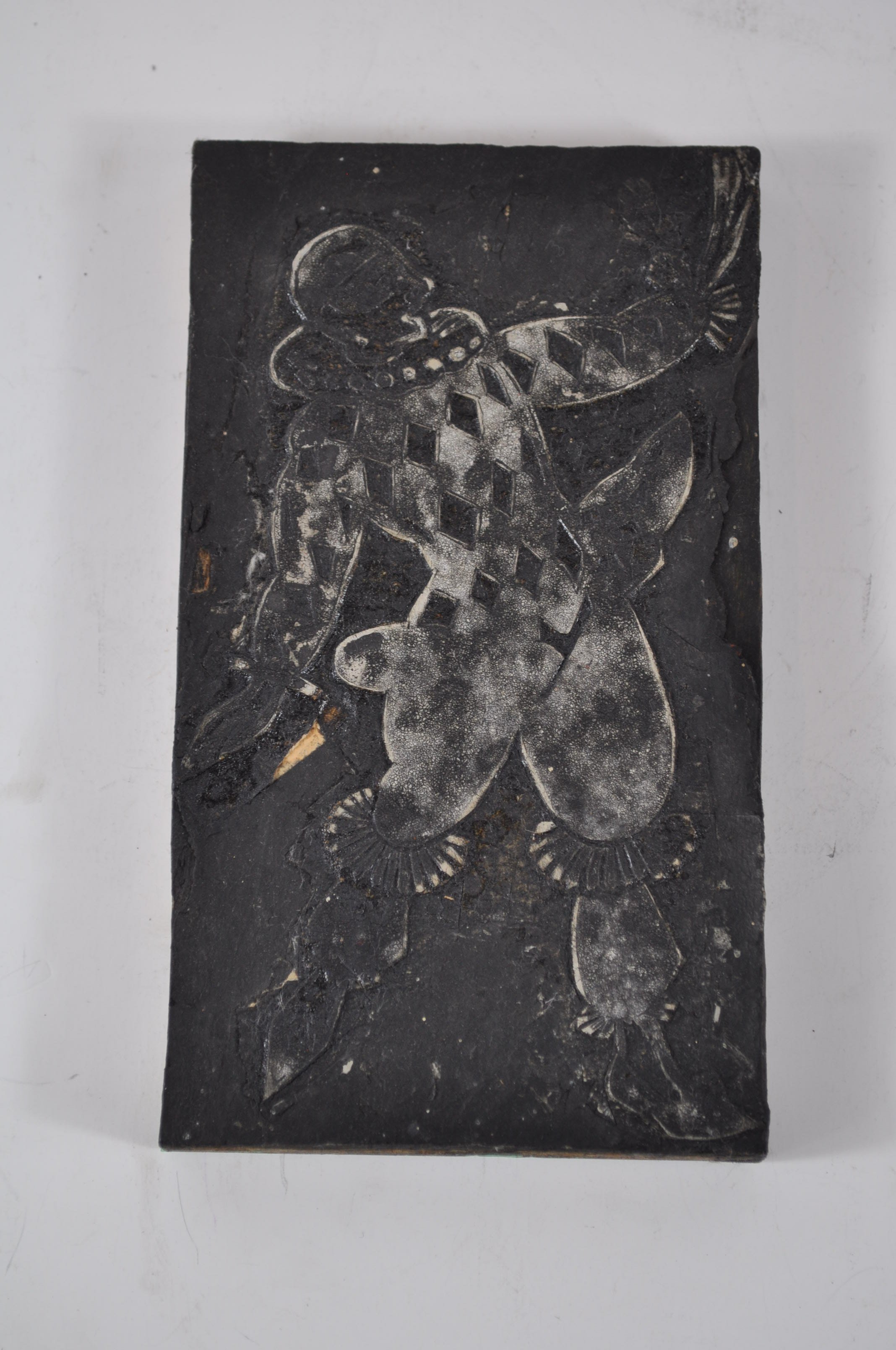 Linolschnitt mit der Abbildung eines Harlekin (Rheinland-Pfälzisches Freilichtmuseum CC BY-NC-SA)