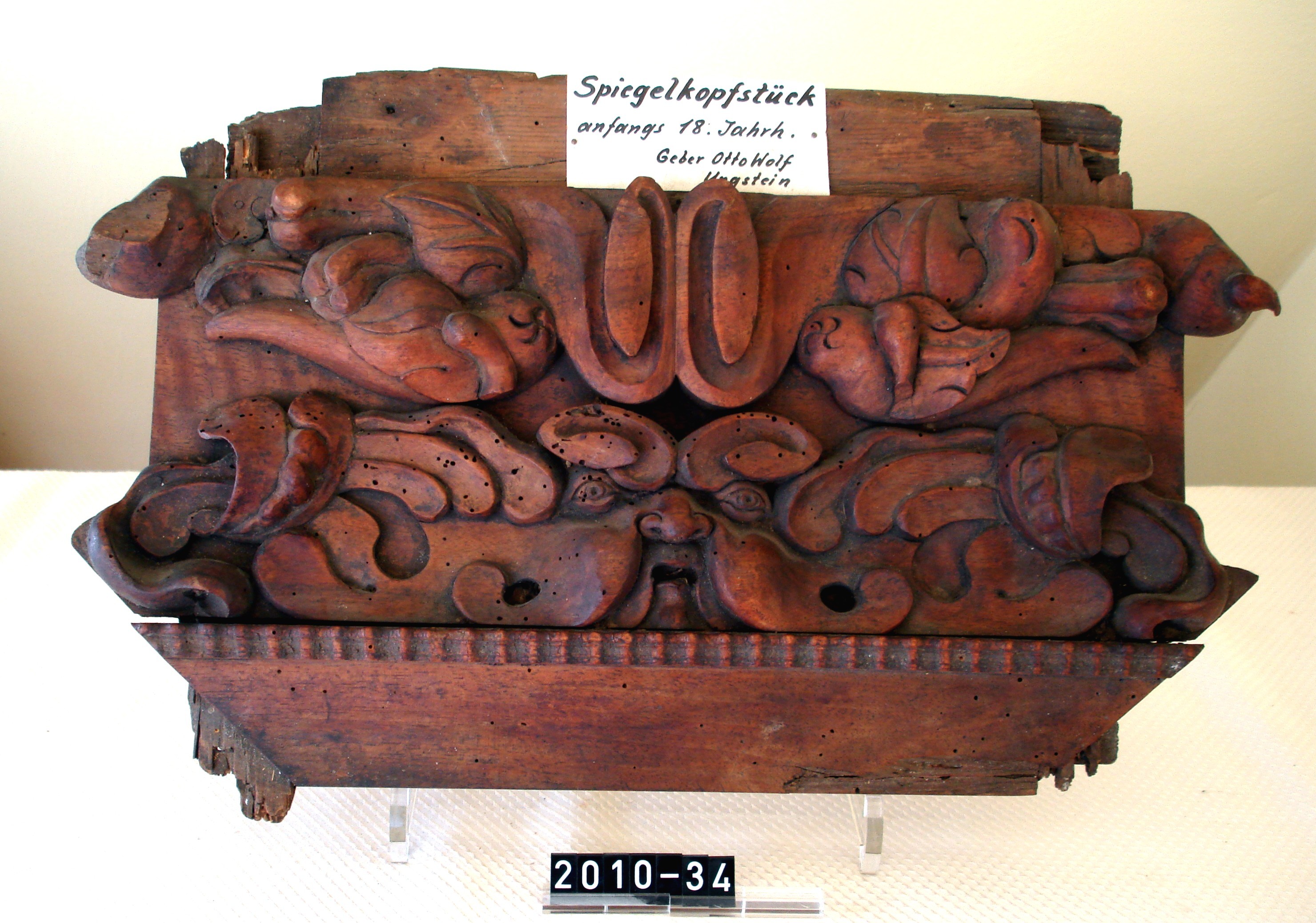 Spiegelkopfstück, aus Holz; Anfang 18. Jh. (Stadtmuseum Bad Dürkheim, Museumsgesellschaft Bad Dürkheim e.V. CC BY-NC-SA)