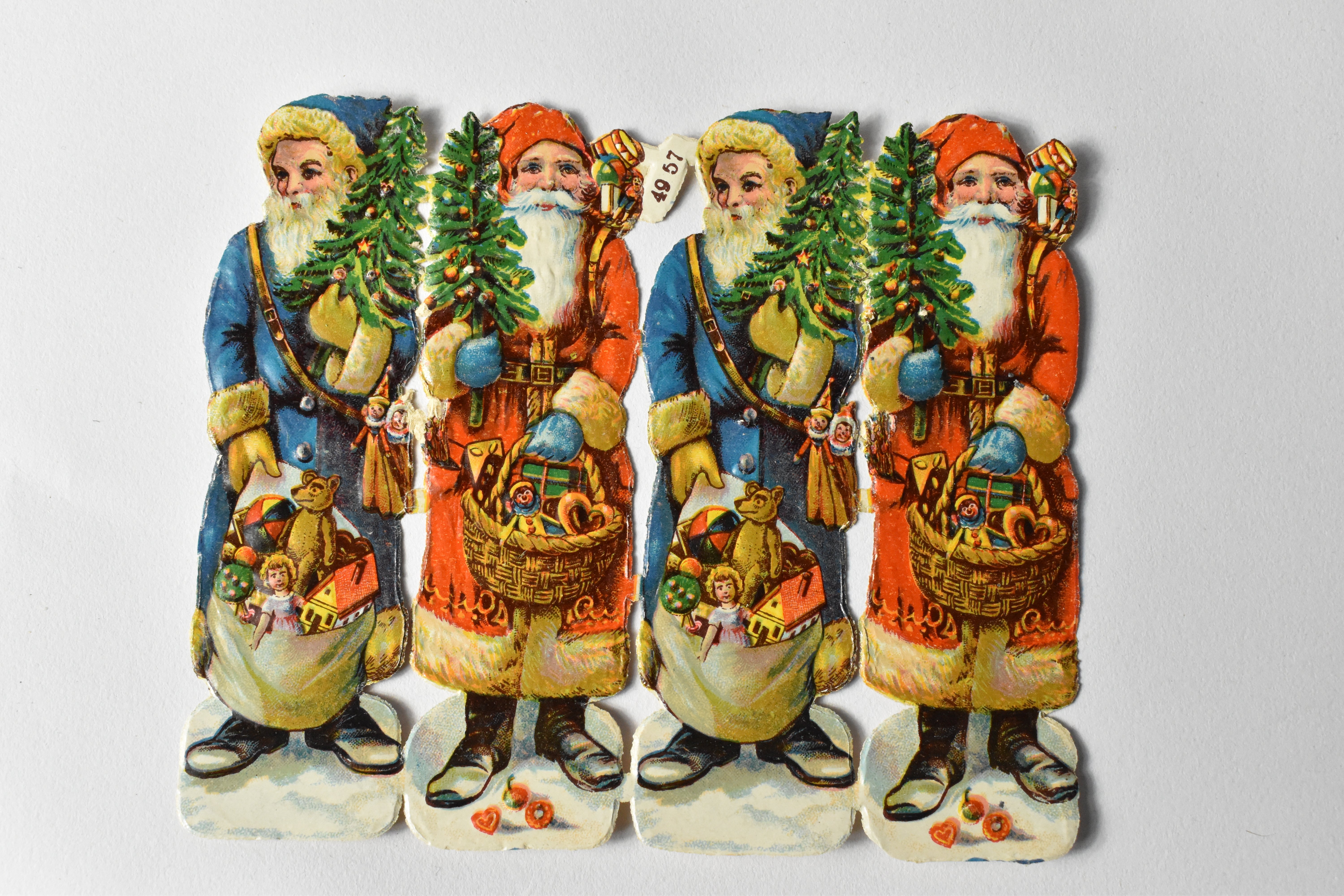 Bogen Oblatenbilder, Glanzbilder aus Prägepappe, Weihnachtsmänner (Heimatwelten Zwönitz CC BY-NC-SA)