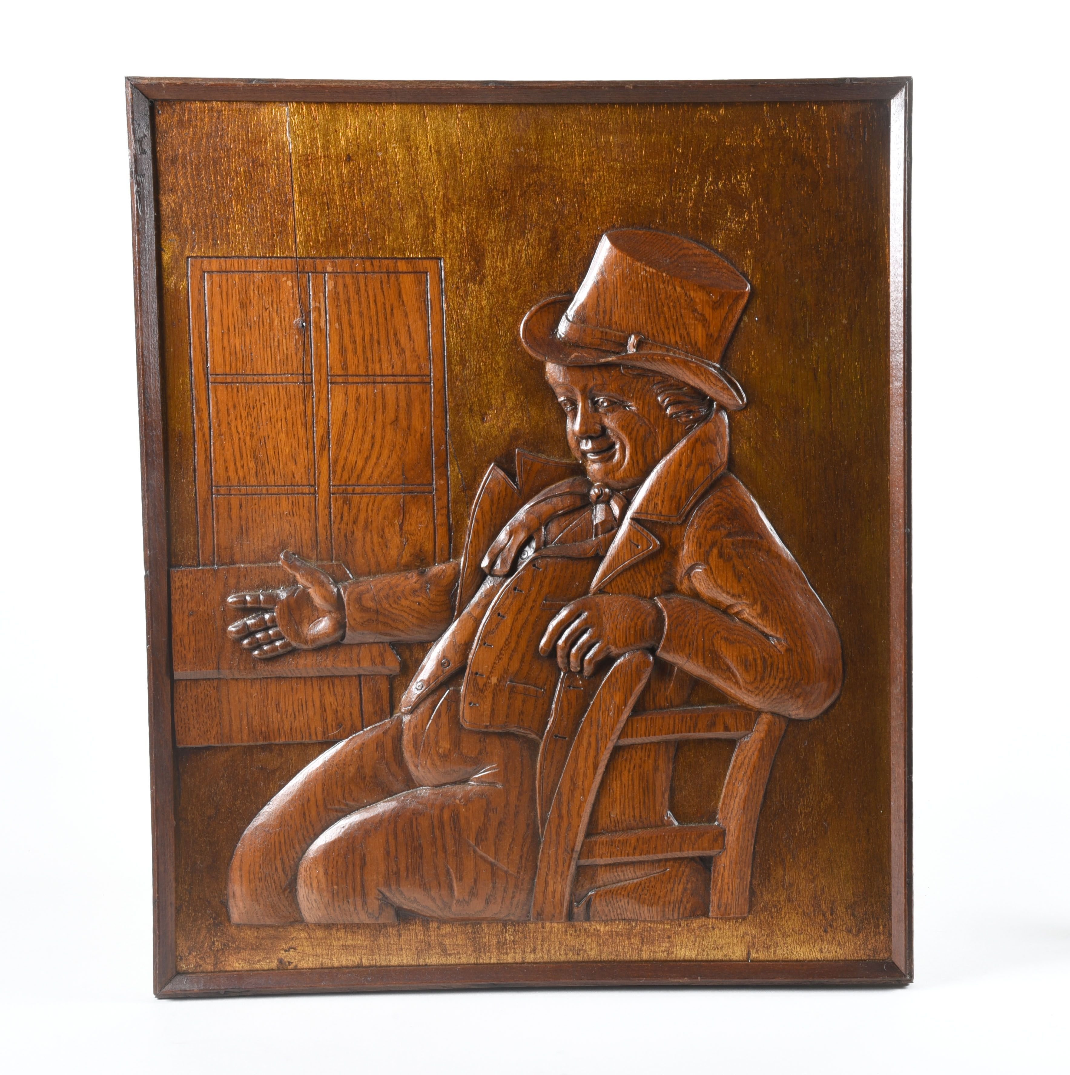 Relieftafel einer Gaststätte mit sitzendem Mann (Stadtmuseum Lichtenstein CC BY-NC-SA)