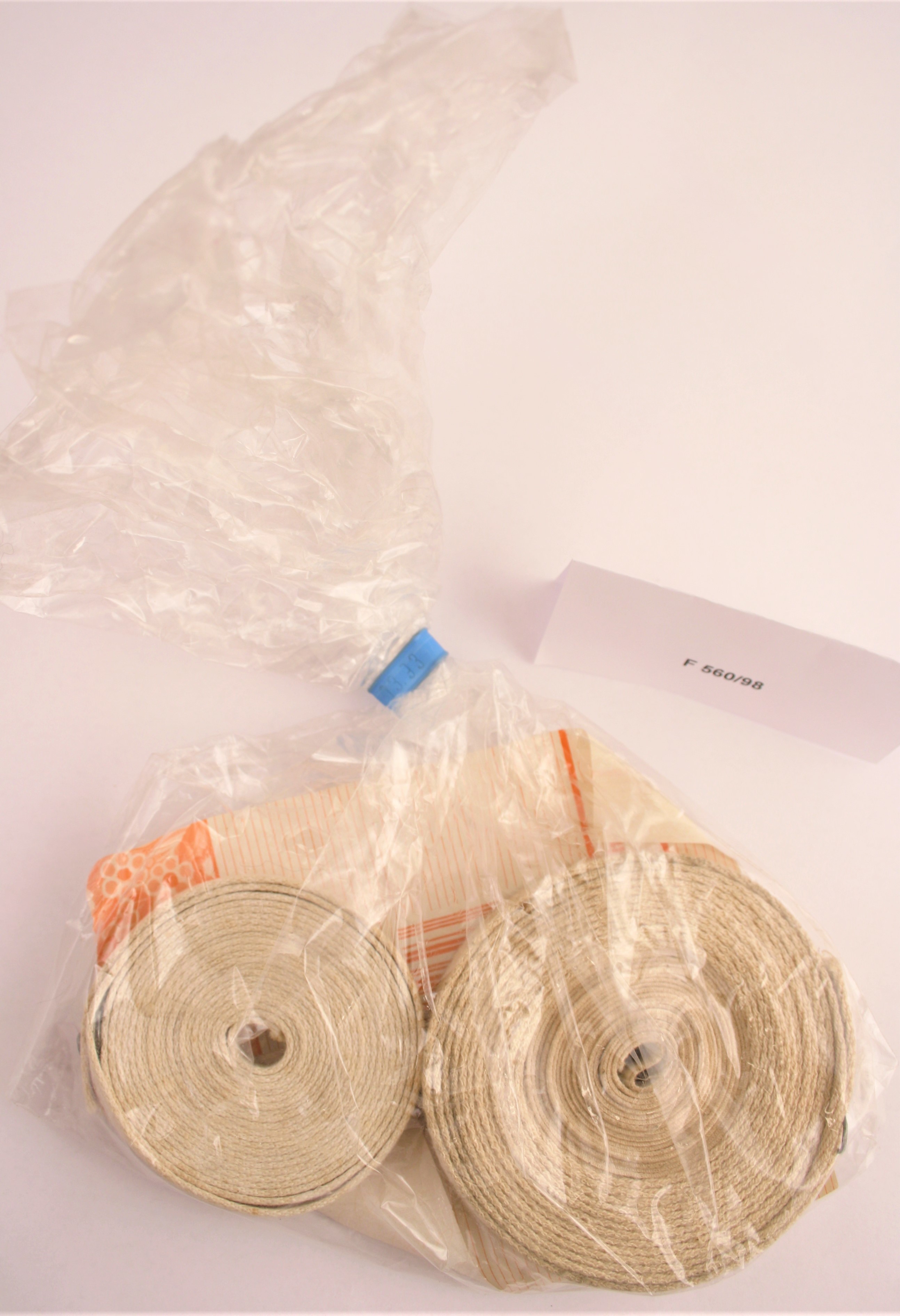 Spindelbänder in durchsichtiger Kunststofftüte (Industrie- und Filmmuseum Wolfen CC BY-NC-SA)