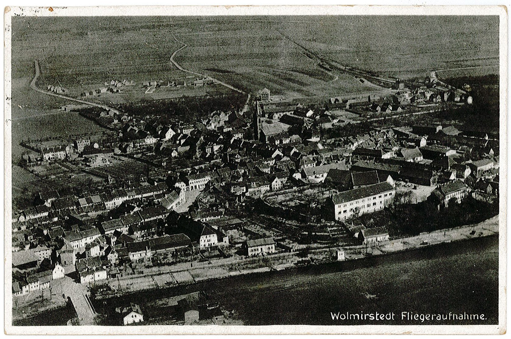 Postkarte: Motiv: Luftbildaufnahme - "Wolmirstedt Fliegeraufnahme" (Museum Wolmirstedt RR-F)