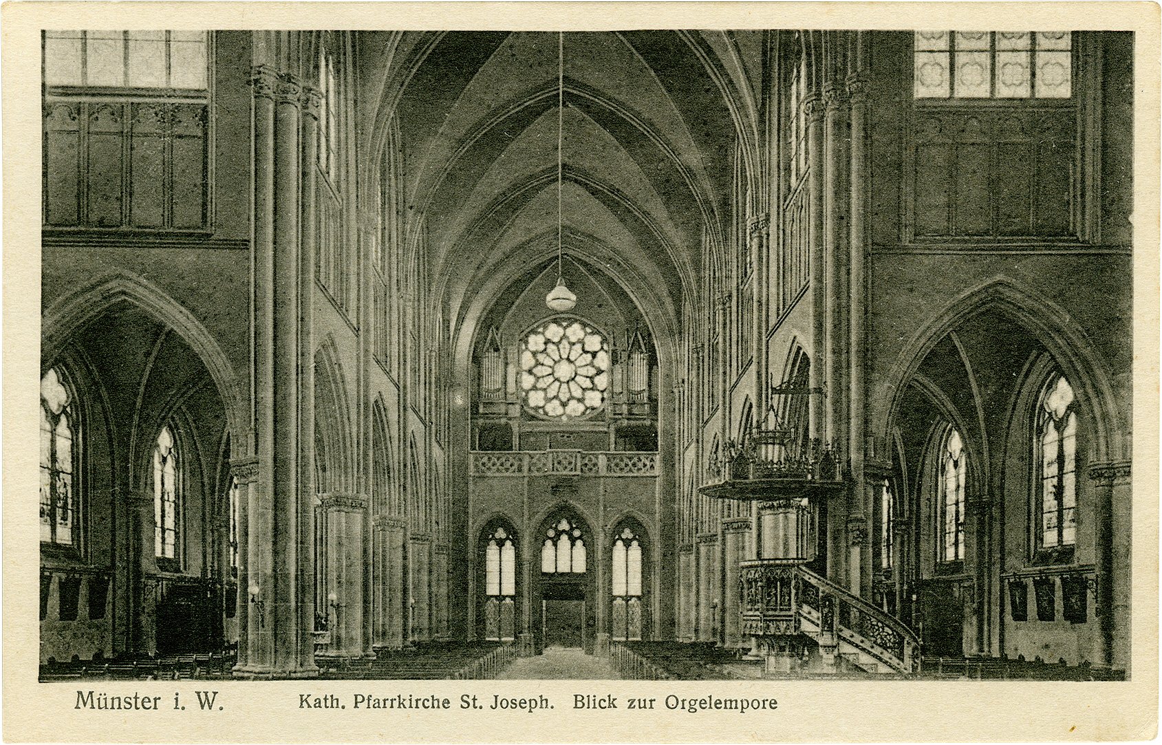 Postkarte: Blick auf die Orgelempore und das Eingangsportal der Josephskirche. (Stadtmuseum Münster CC BY-NC-SA)