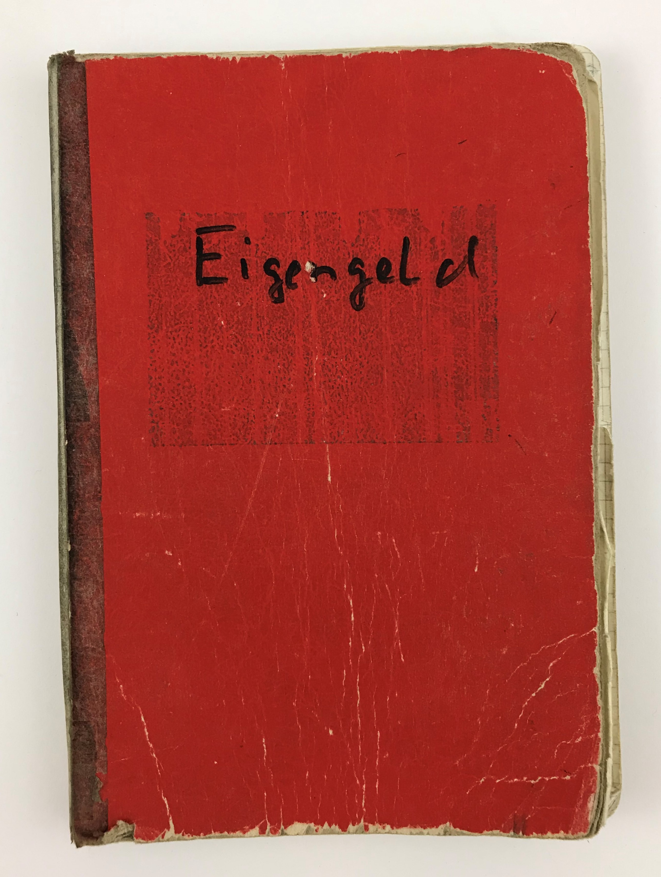 Rotes Schreibheft „Eigengeld“ (LWL-Psychiatriemuseum Warstein CC BY-NC-SA)