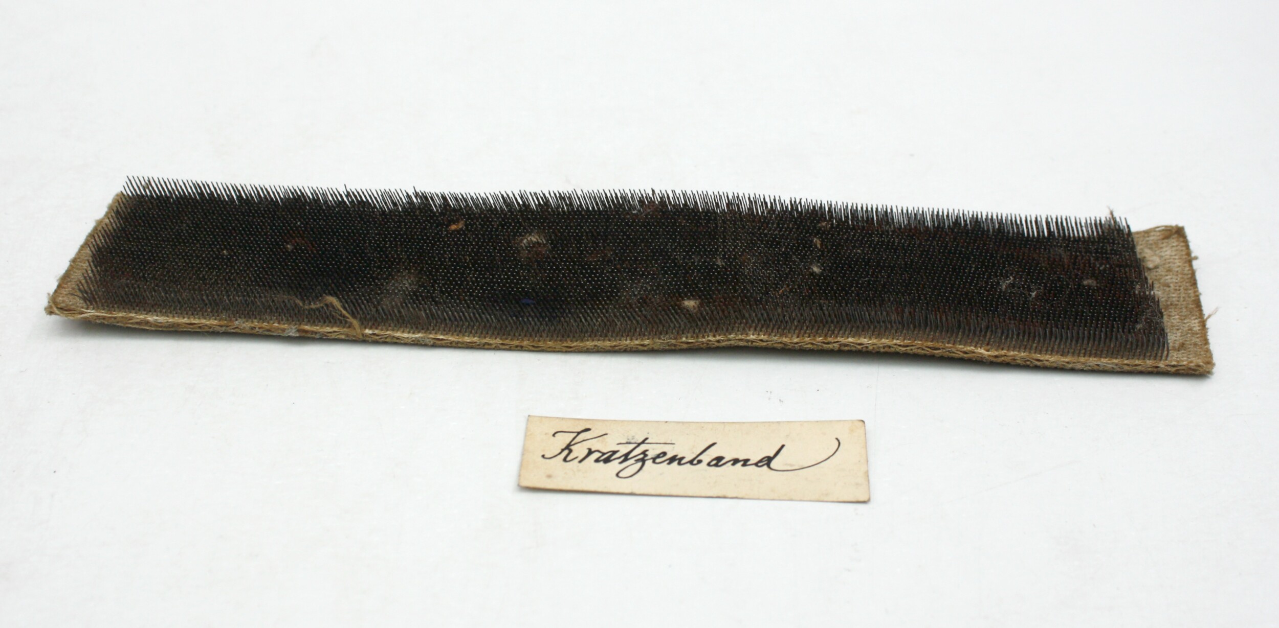 Kratzenband (Drilandmuseum CC BY-NC-SA)