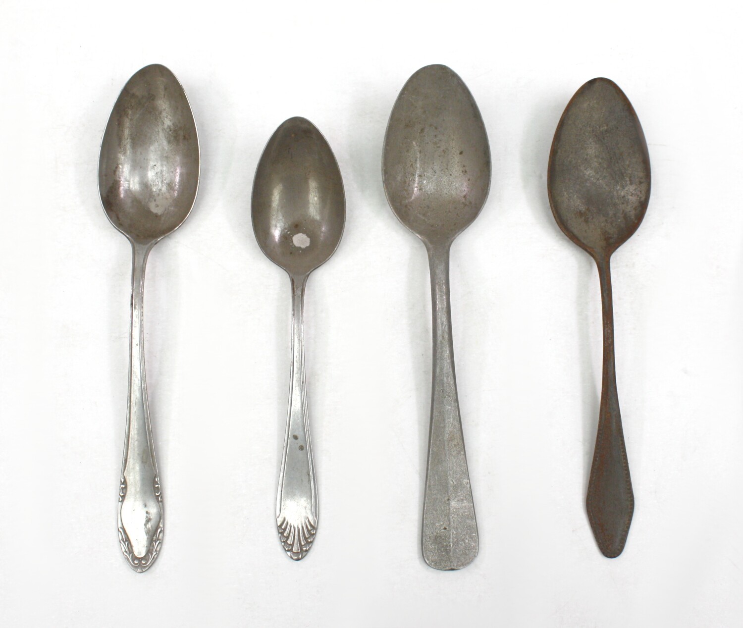 Vier Löffel aus Aluminium (Drilandmuseum CC BY-NC-SA)